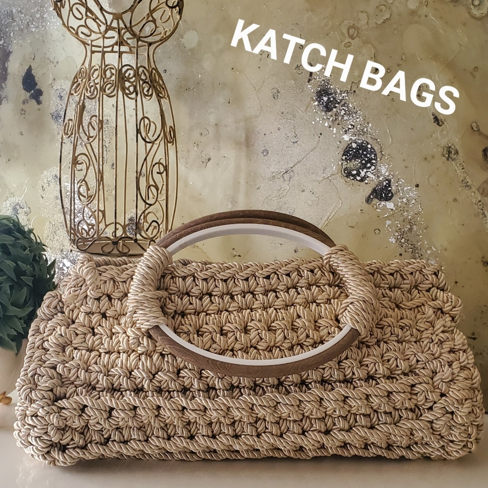 Beautiful stylish crochet purse. Silky rope material. 14"×7" crochet base.